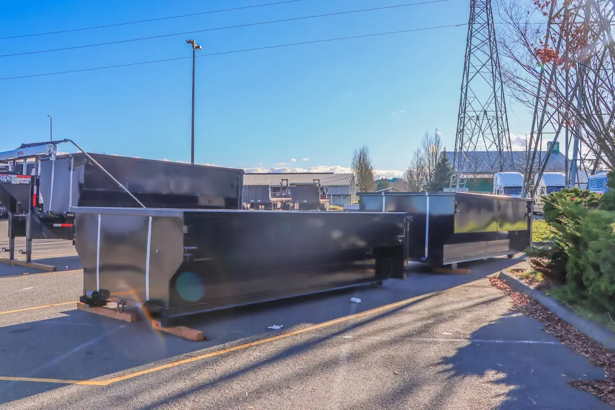 Roll-off dumpster ready for waste disposal at job site for Construction Dumpster Rental in Troutdale